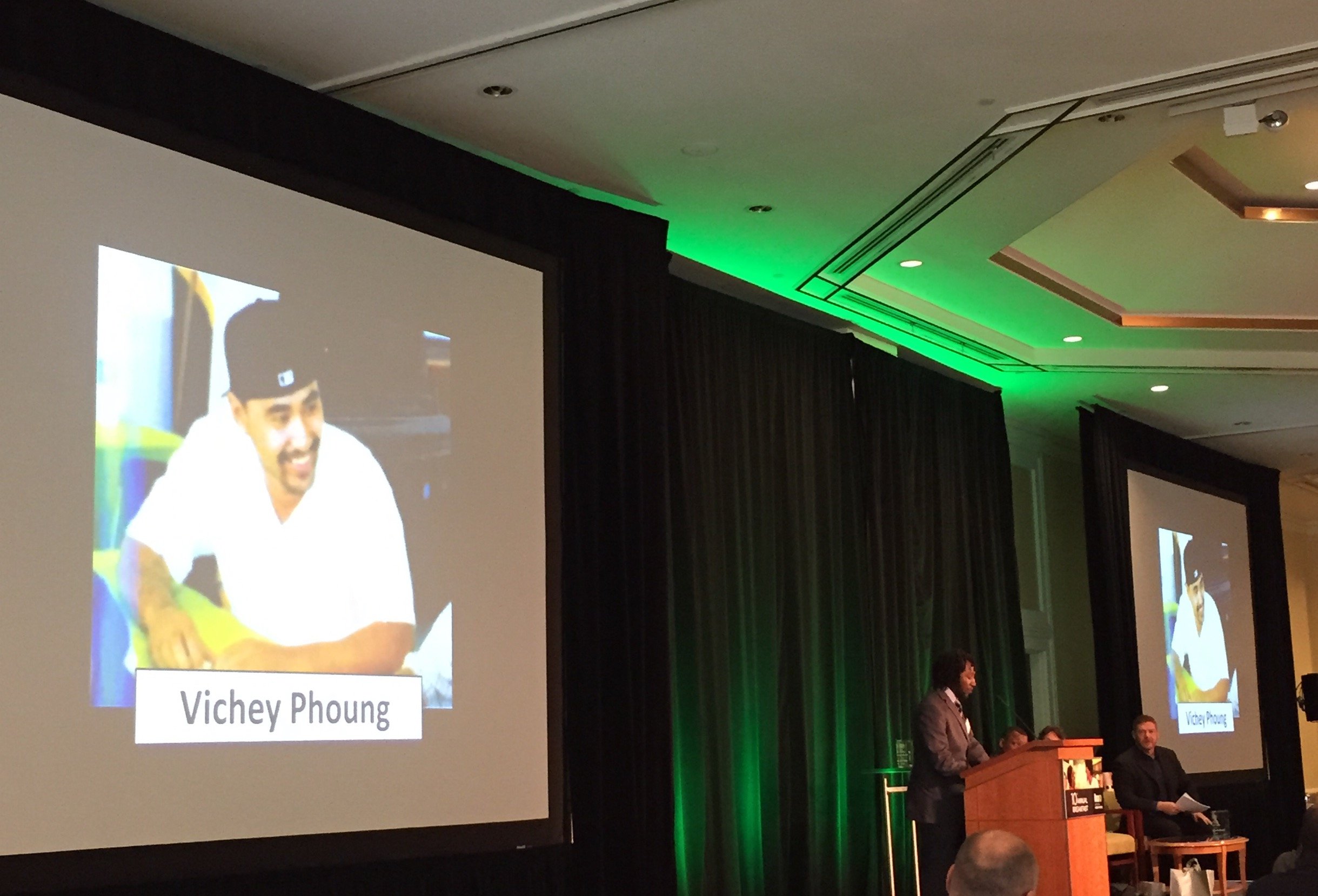 Roca participant Trevor Gayle receives the Vichey Phuong Peace Award at Roca's 10th Annual Breakfast.